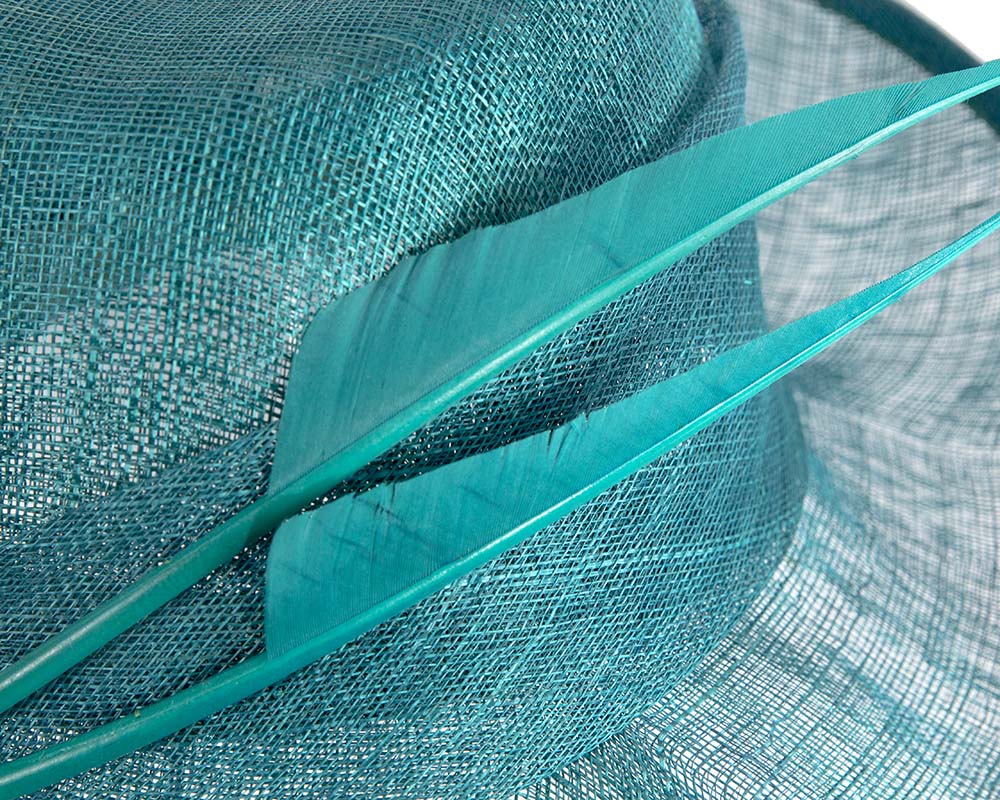 Elegant teal green hat with feathers