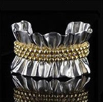 Ruffle Cuff Bracelet: Diamonds in Sterling Silver with 18K Gold Plate Options.