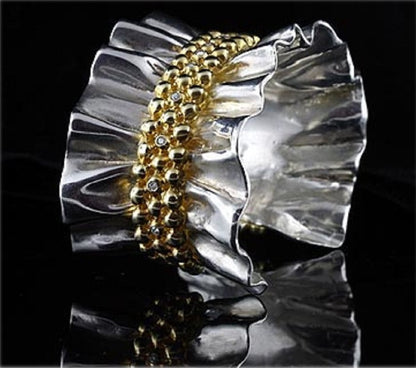 Ruffle Cuff Bracelet: Diamonds in Sterling Silver with 18K Gold Plate Options.