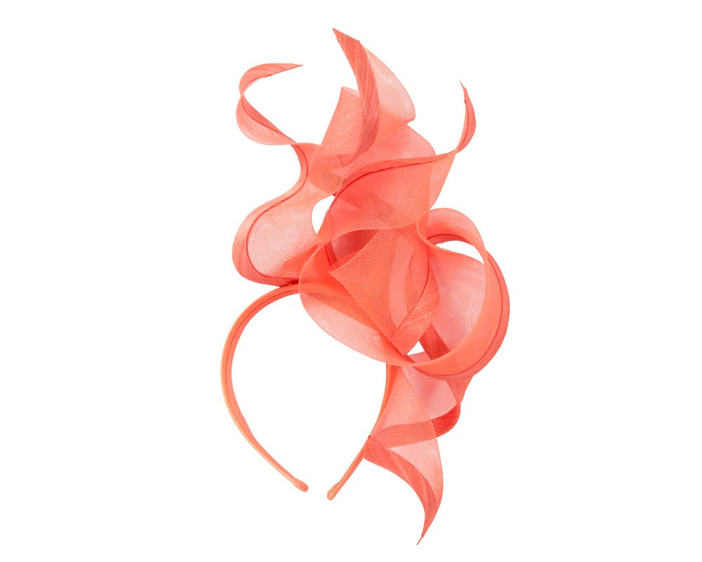 Bespoke coral racing fascinator by Fillies Collection